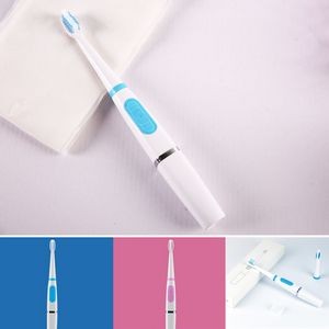 Electric Toothbrush W/ Two Brushes