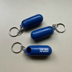 Capsule Shaped Pill Box With Key Ring