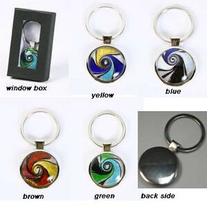 Keychain with colorful swirl design in Glass bubble. (Engraved)