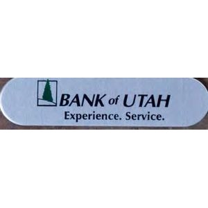 3"x 3/4" Oblong Aluminum Badge with an epoxy screen printed imprint and a pin back attachment. USA