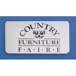 2" X 1" Aluminum Badge w/ a Die struck/Color filled imprint and a pin back attachment. USA