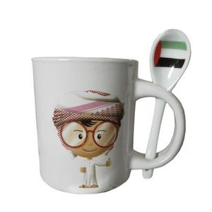 White ceramic mug with spoon